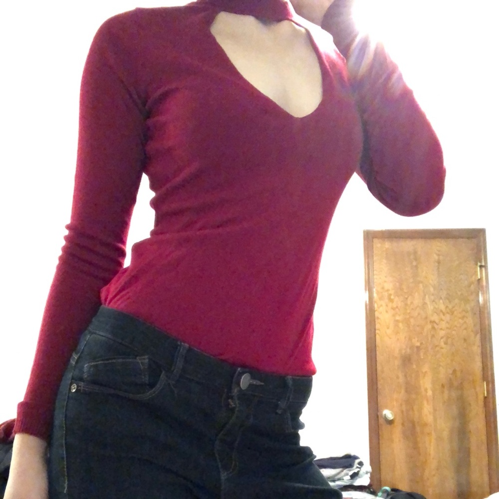 Red sweater triangle cut in center
